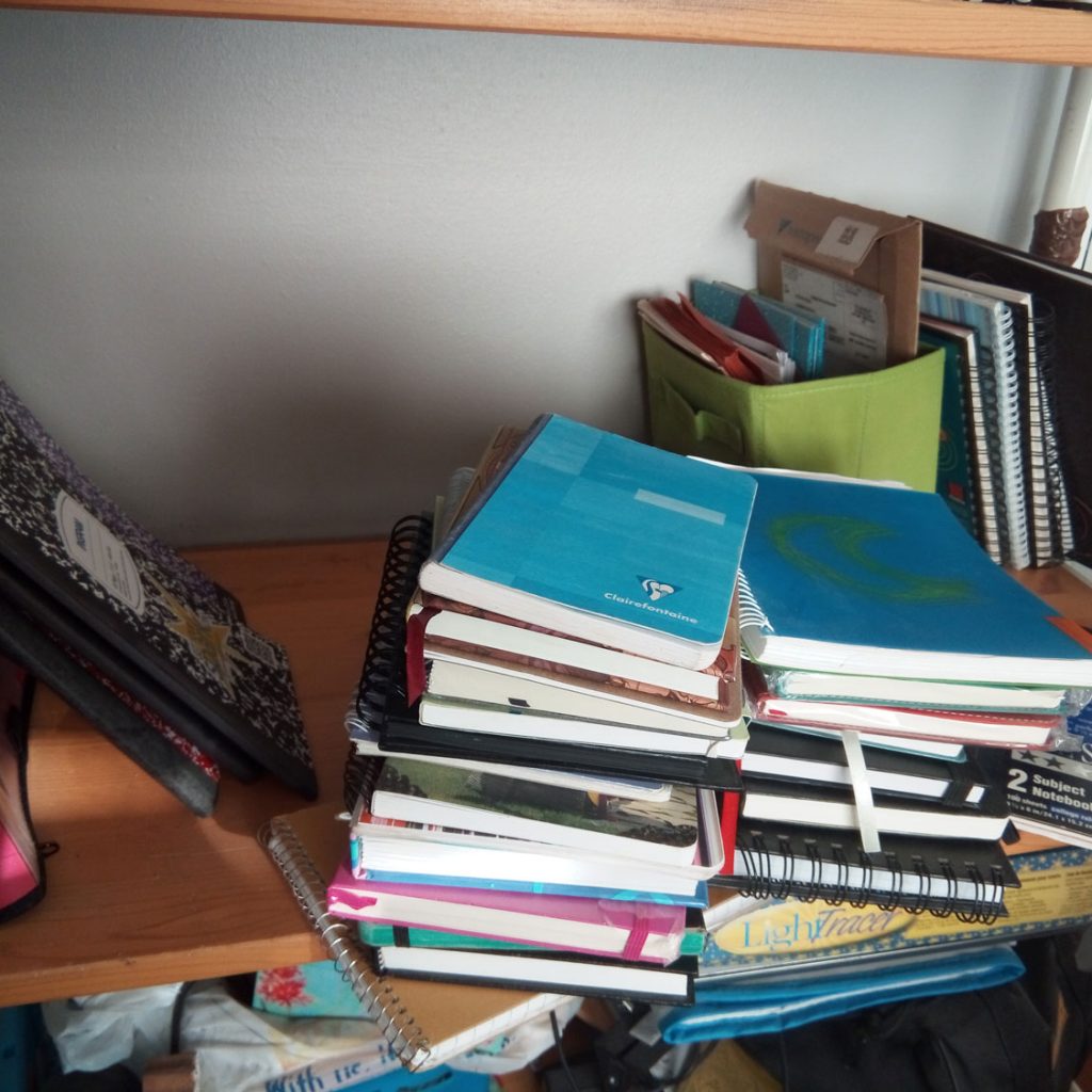 Sorting notebooks into piles by size